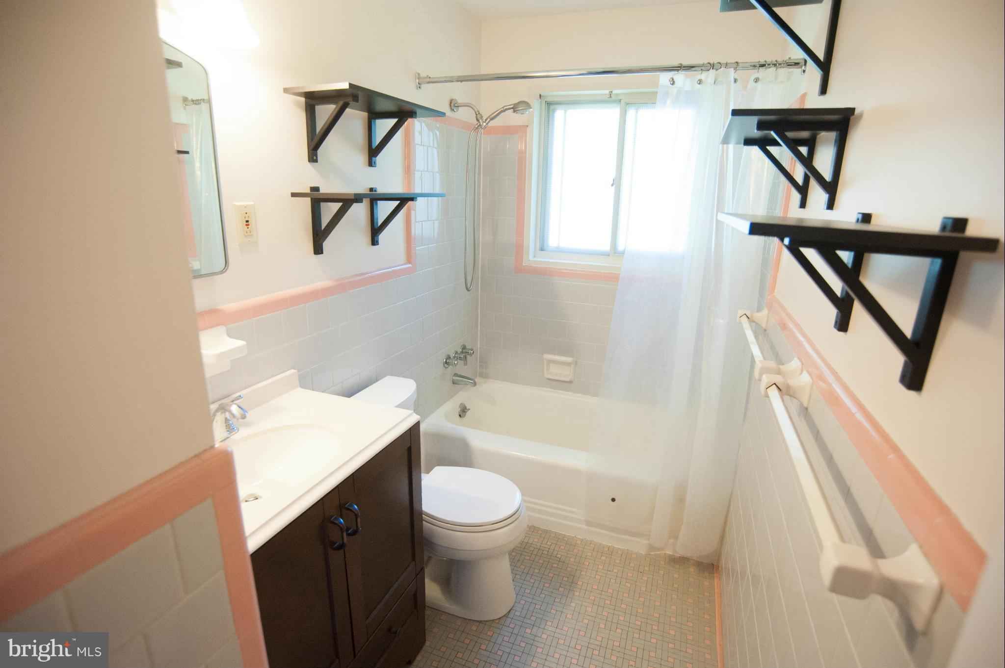 16 Goodrich Road Annapolis, MD 21401 - Photo 11 of 27 a bathroom with a sink a toilet and bathtub