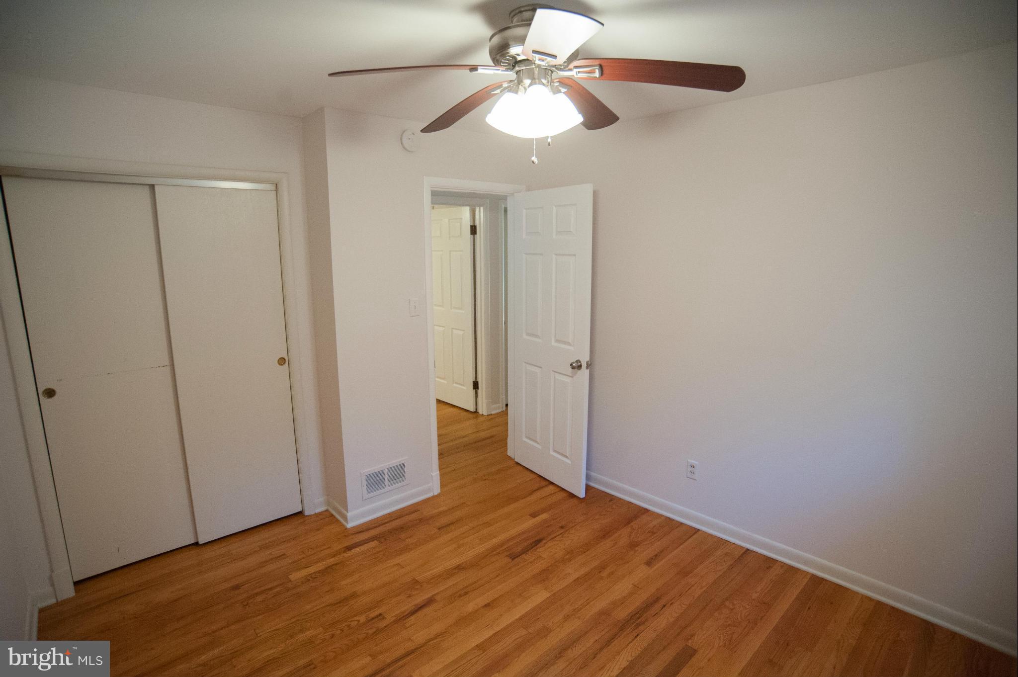 16 Goodrich Road Annapolis, MD 21401 - Photo 9 of 27 a view of empty room with window and a ceiling fan
