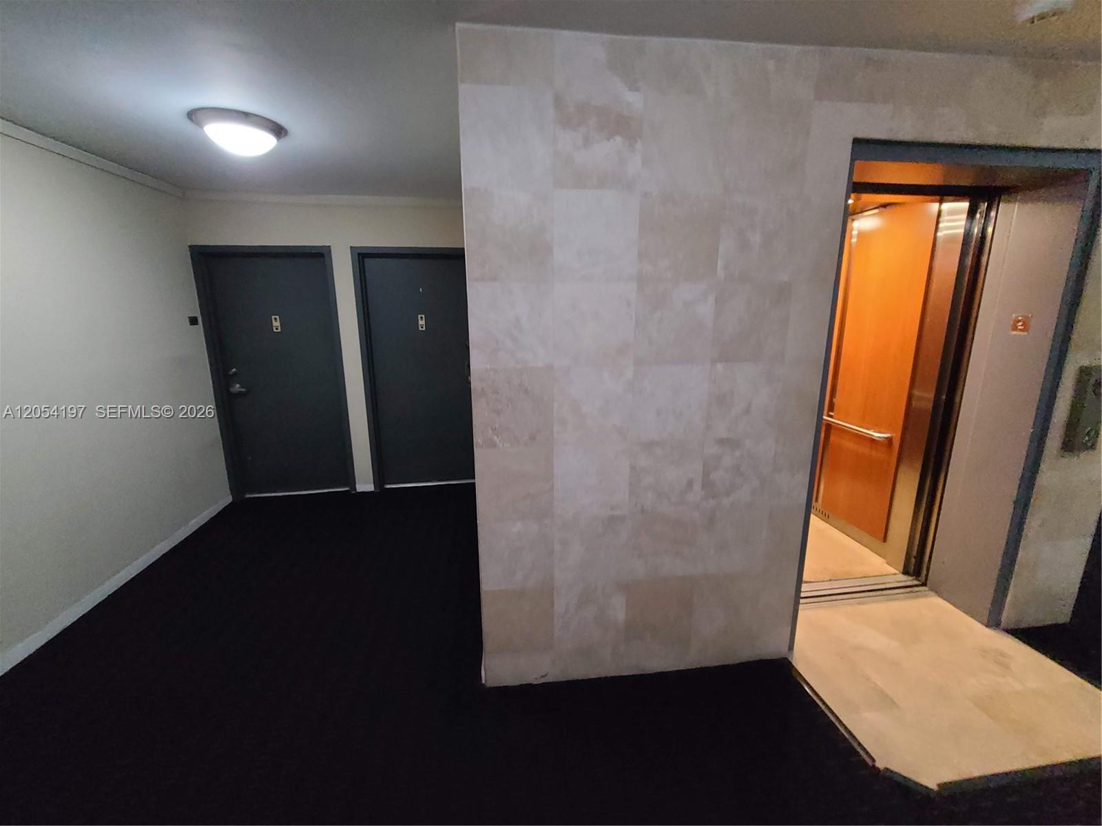 1605 Bay Road, Unit 206 Miami Beach, FL 33139 - Photo 12 of 43 Extra closet & guest bathroom on the left, entering the unit