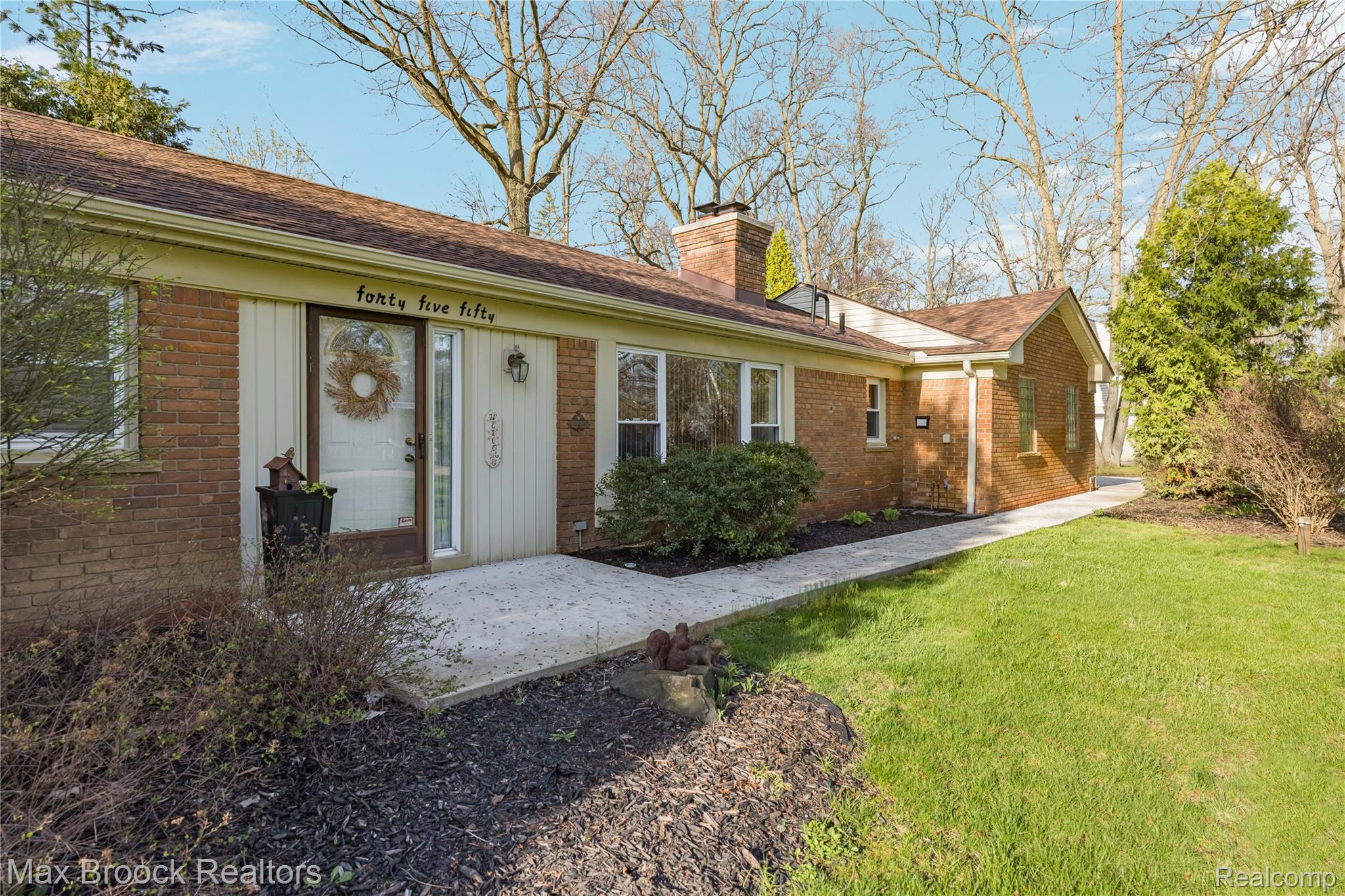 4550 Patrick Road West Bloomfield, MI 48322 - Photo 2 of 48 New walkway. No steps to enter the house.