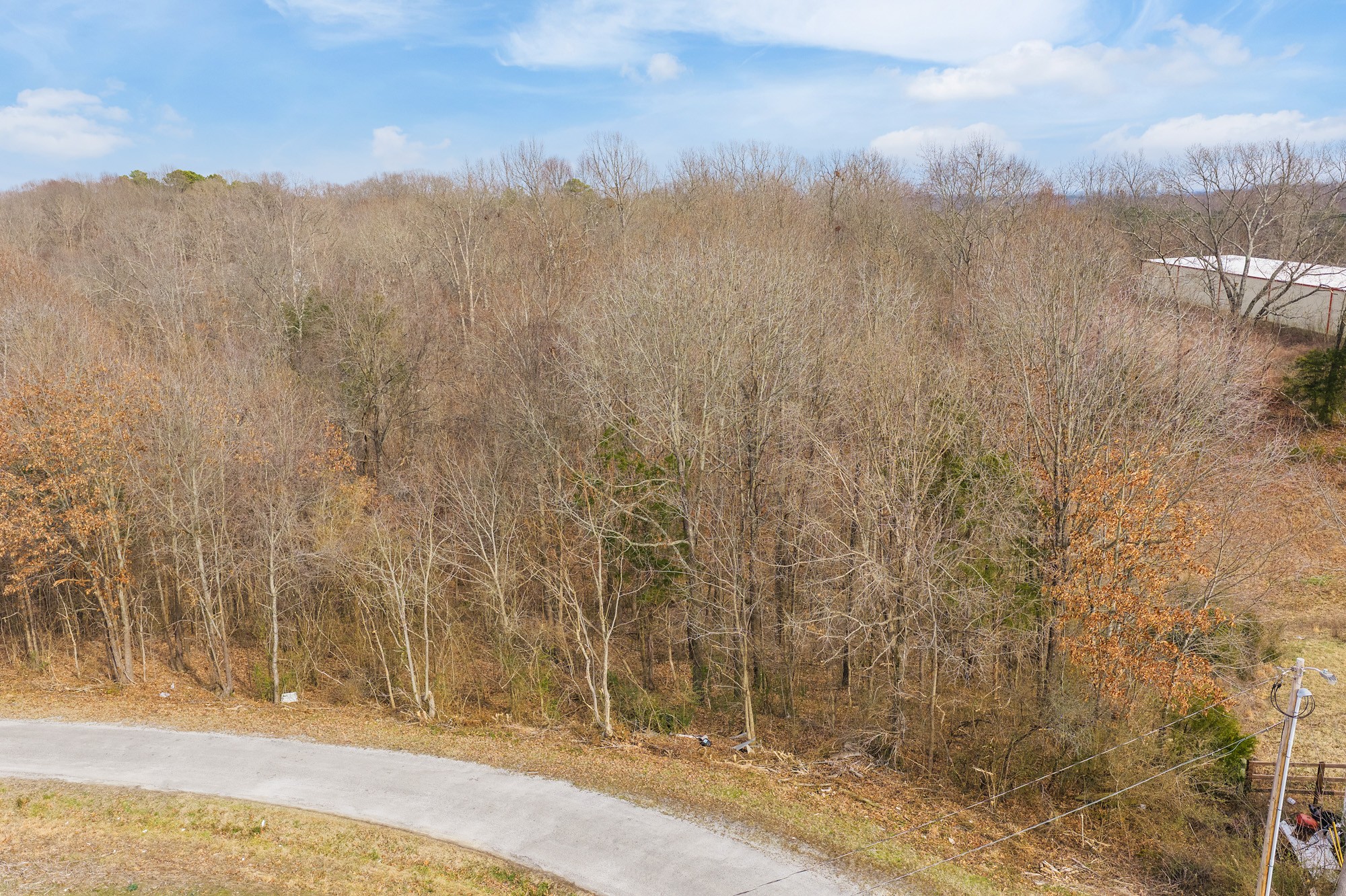 0 Kehrer Lane Huntingdon, TN 38344 - Photo 21 of 23 a view of a yard next to a building