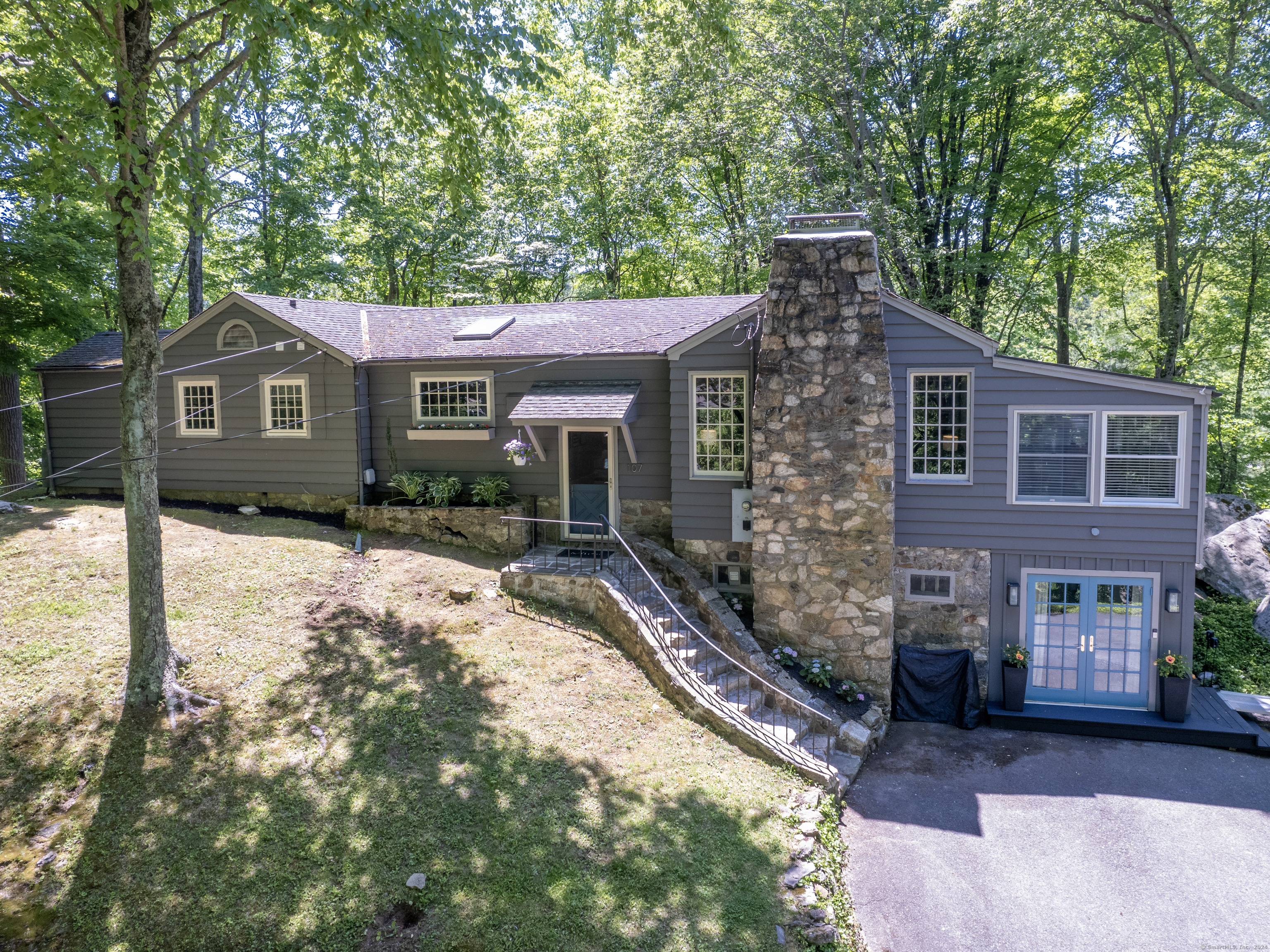 a front view of a house with yard