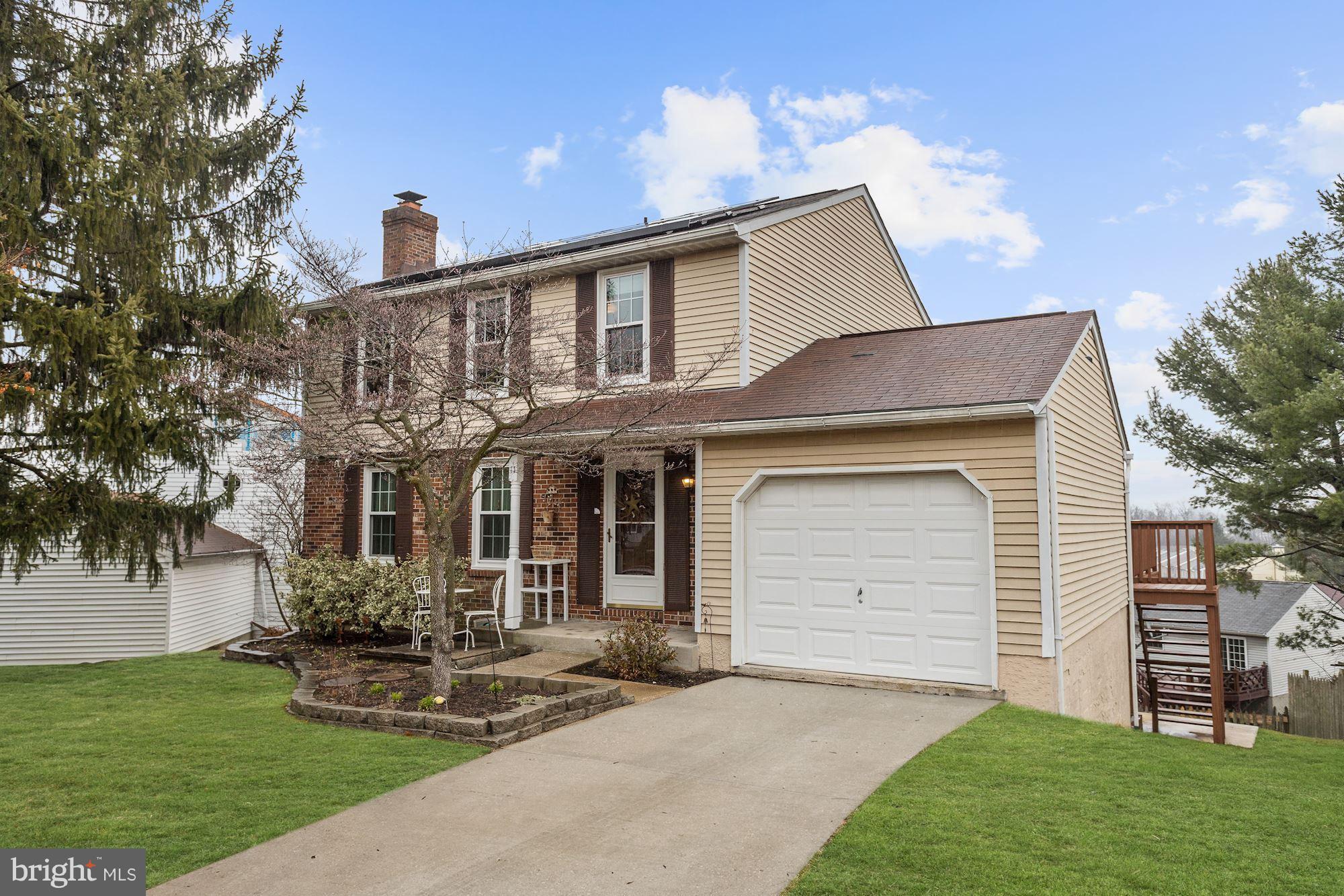 11 Class Court Baltimore, MD 21234 - Photo 1 of 25 a front view of a house with garden