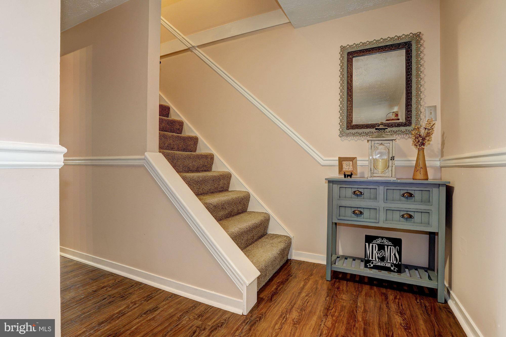 11 Class Court Baltimore, MD 21234 - Photo 2 of 25 a living room with furniture and a wooden floor
