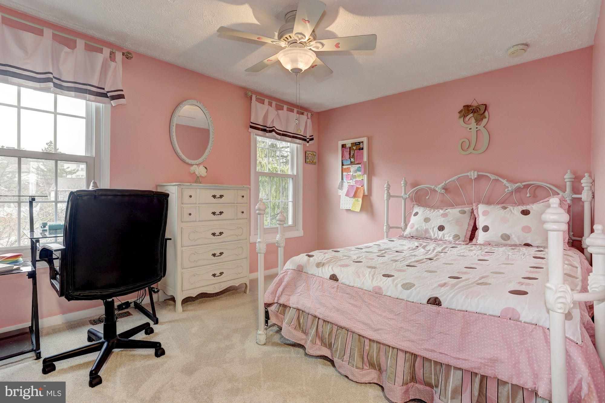 11 Class Court Baltimore, MD 21234 - Photo 15 of 25 a bedroom with a bed a dresser and chair