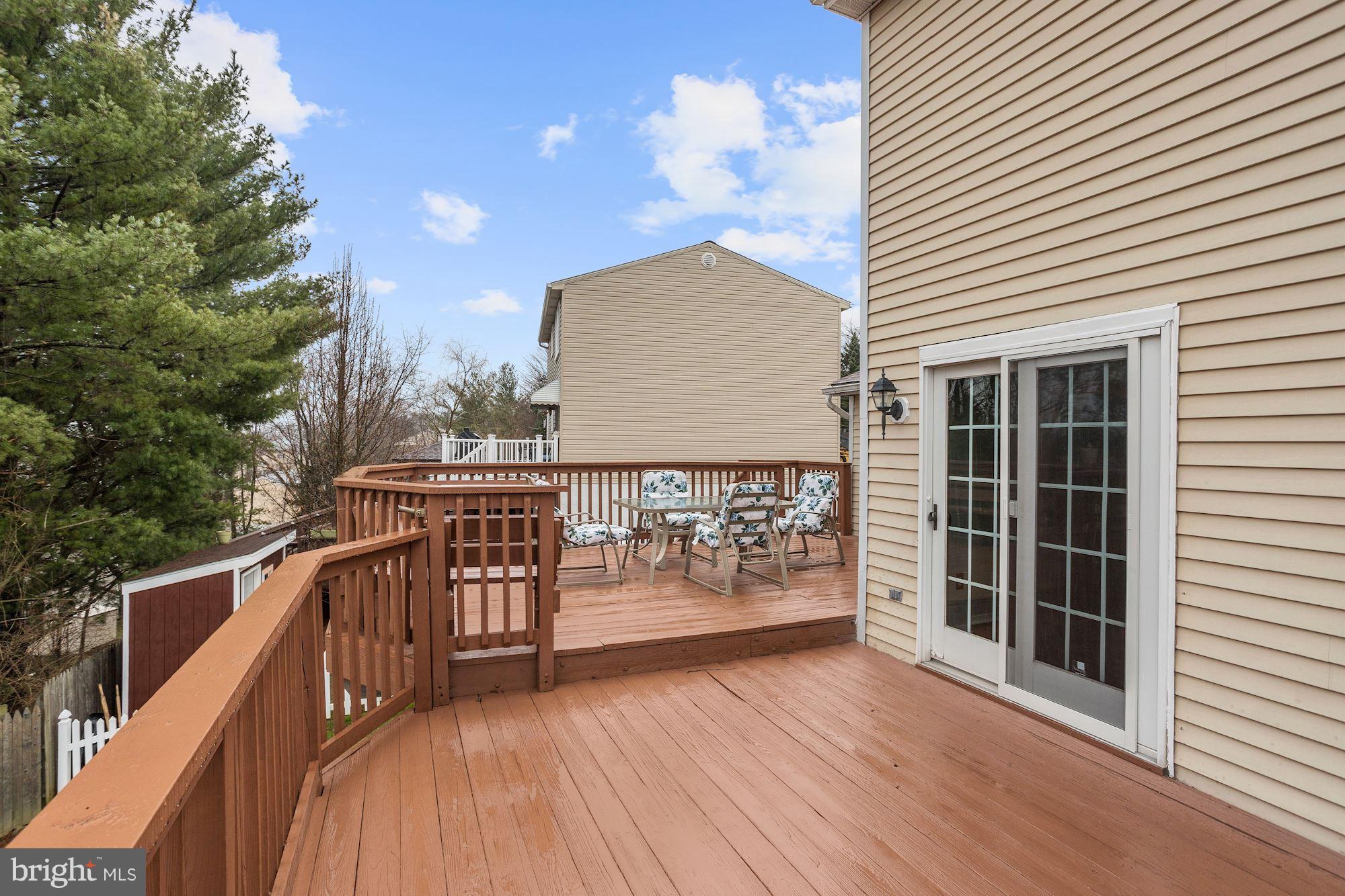 11 Class Court Baltimore, MD 21234 - Photo 23 of 25 a view of a balcony with wooden floor and fence