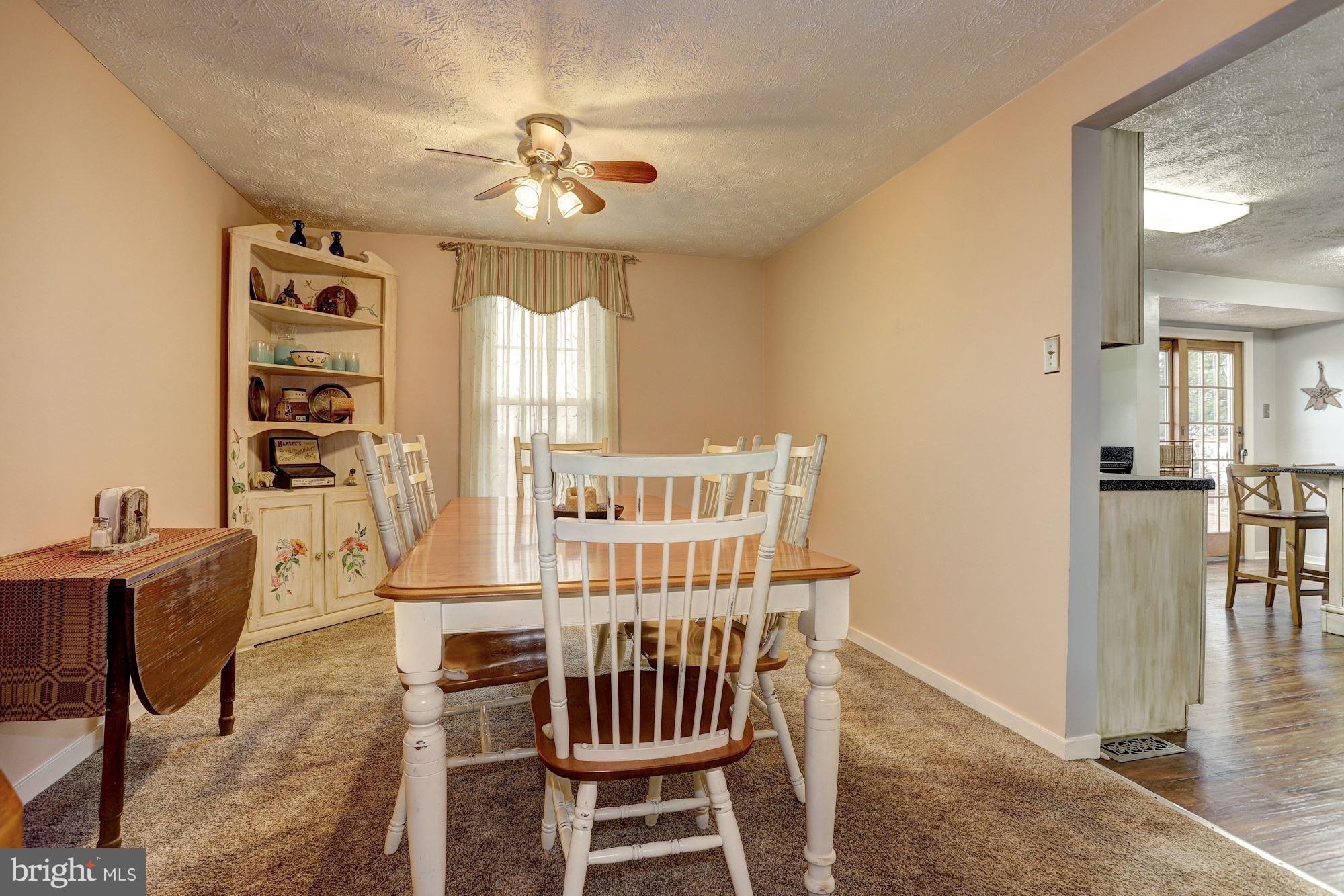 11 Class Court Baltimore, MD 21234 - Photo 7 of 25 a view of a dining room with furniture and chandelier