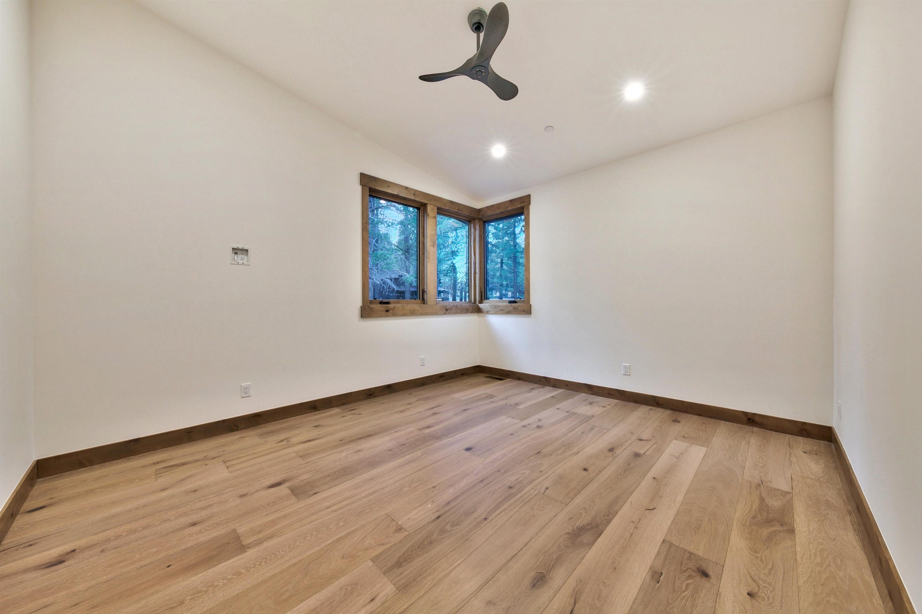 11620 Ghirard Road Truckee, CA 96161 - Photo 20 of 21 wooden floor in an empty room with a window