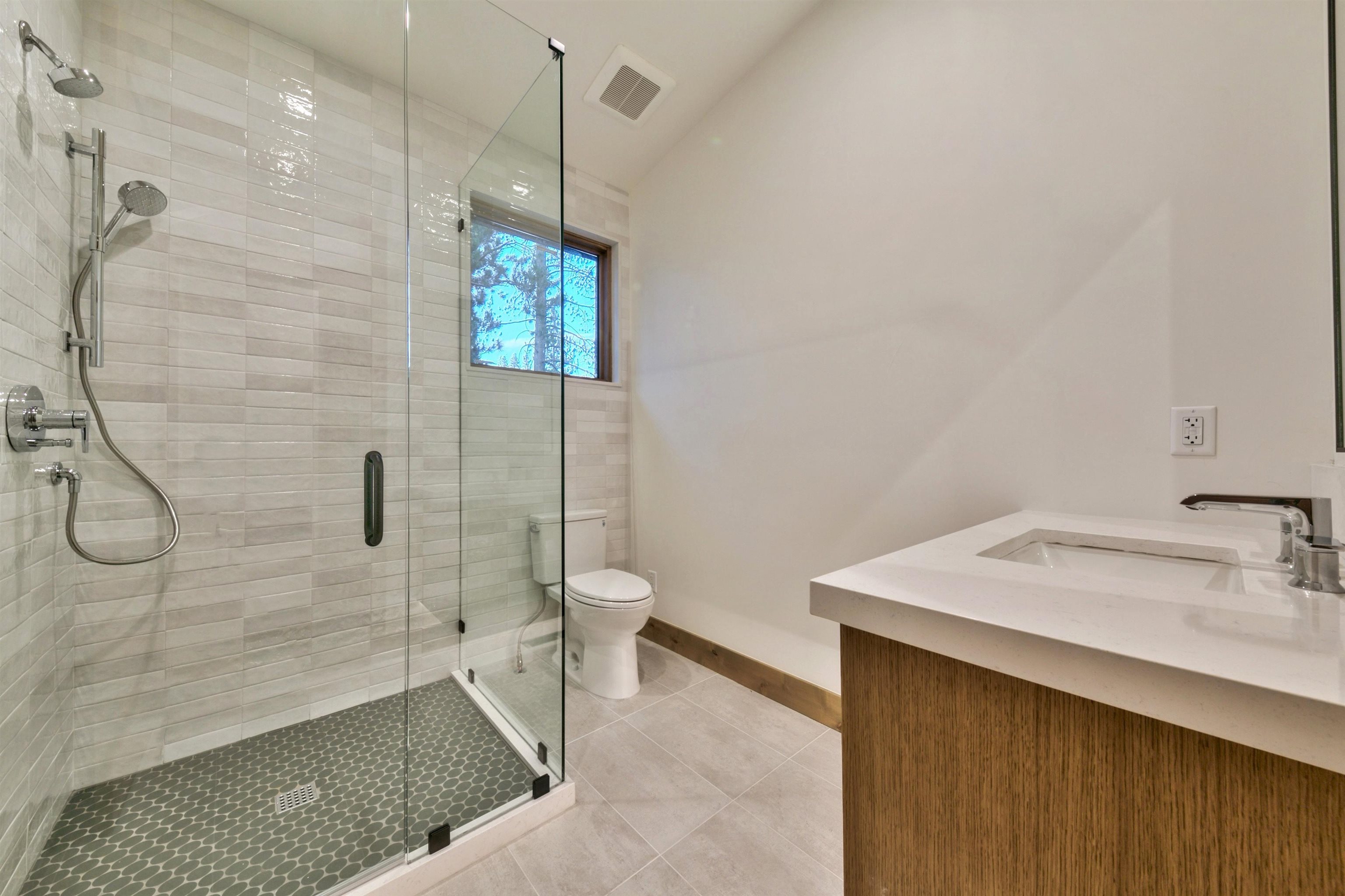 11620 Ghirard Road Truckee, CA 96161 - Photo 21 of 21 a bathroom with a sink a toilet and shower