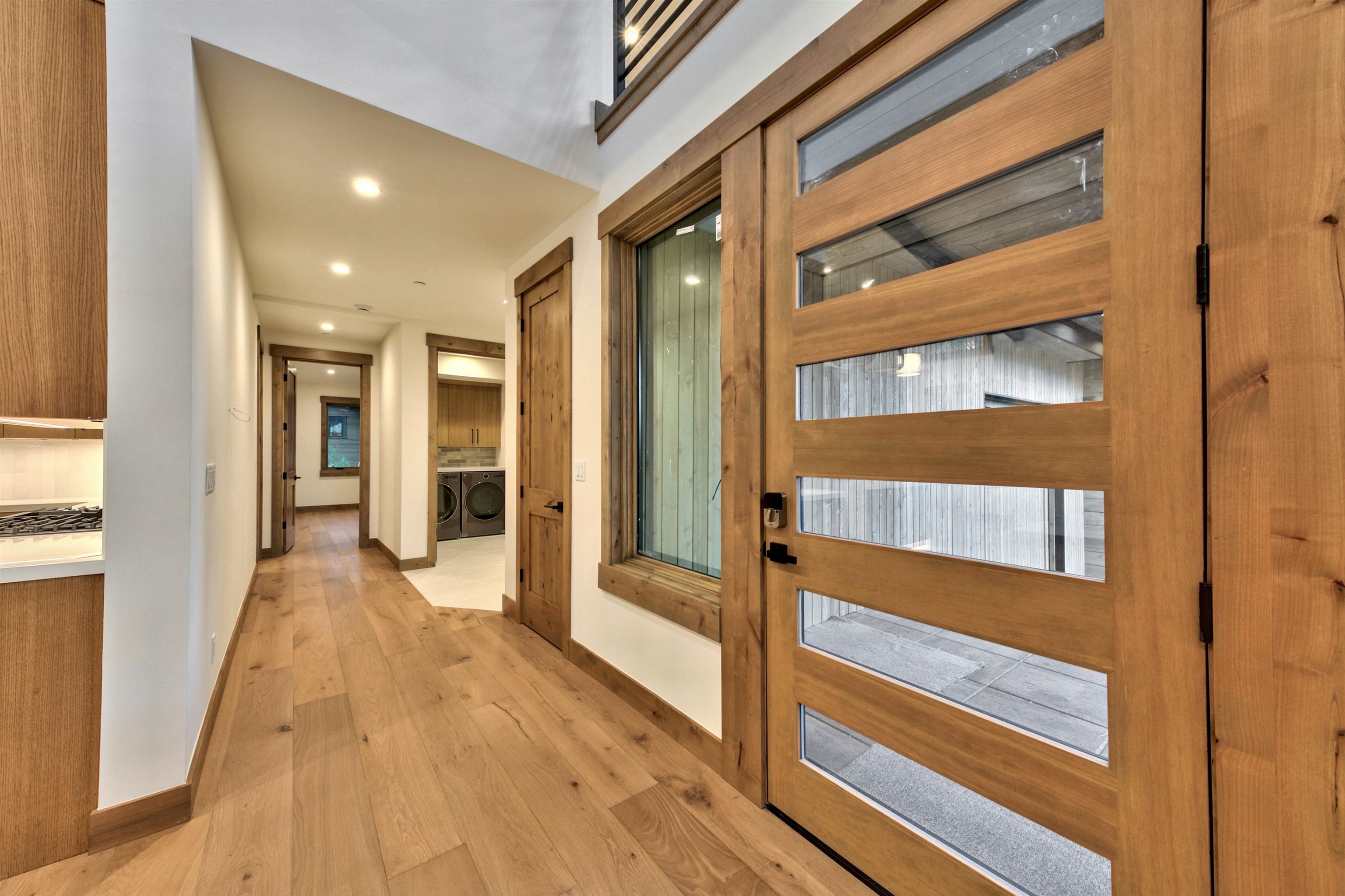 11620 Ghirard Road Truckee, CA 96161 - Photo 5 of 21 a view of hallway with wooden floor and staircase