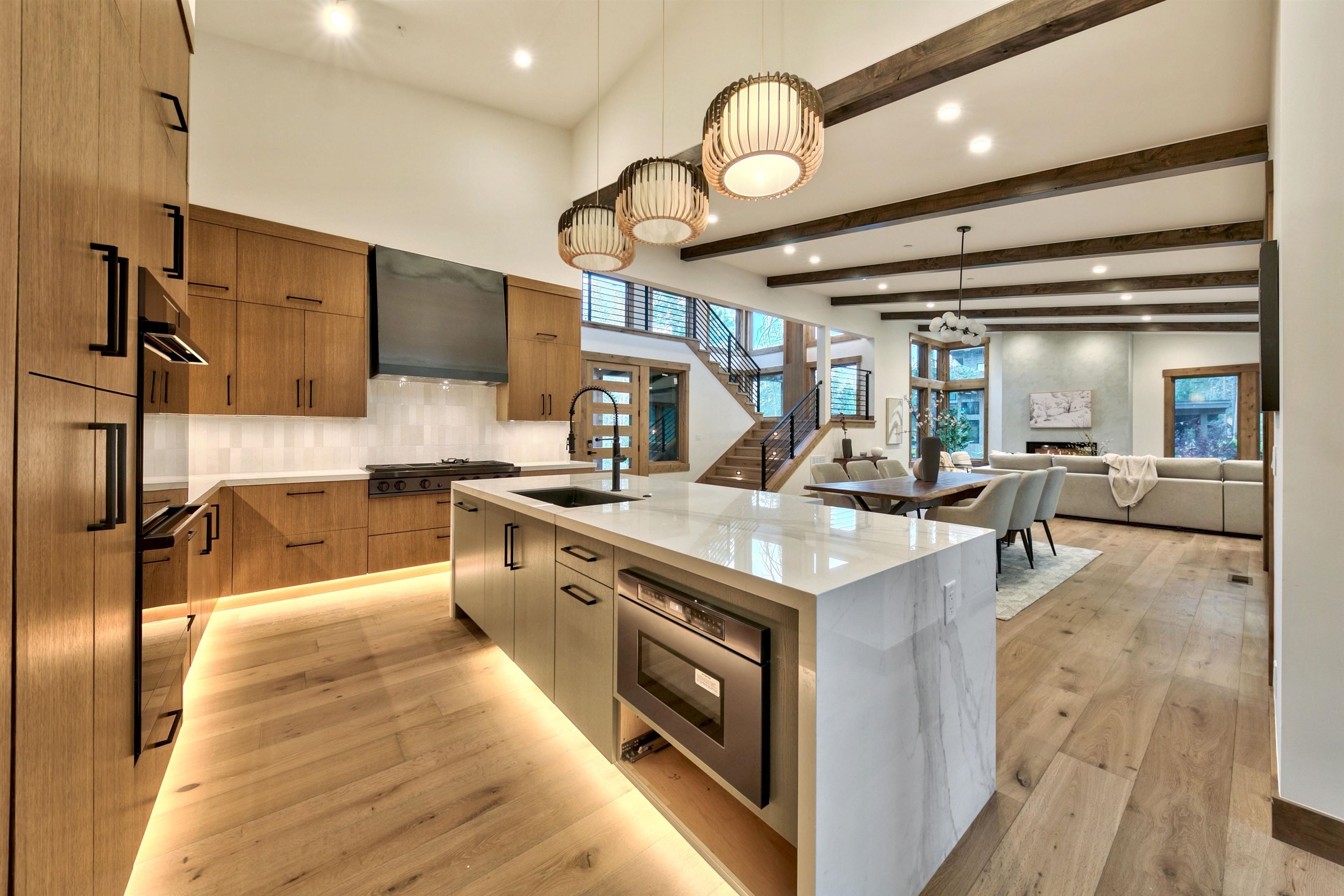 11620 Ghirard Road Truckee, CA 96161 - Photo 8 of 21 a kitchen with stainless steel appliances granite countertop a stove and cabinets