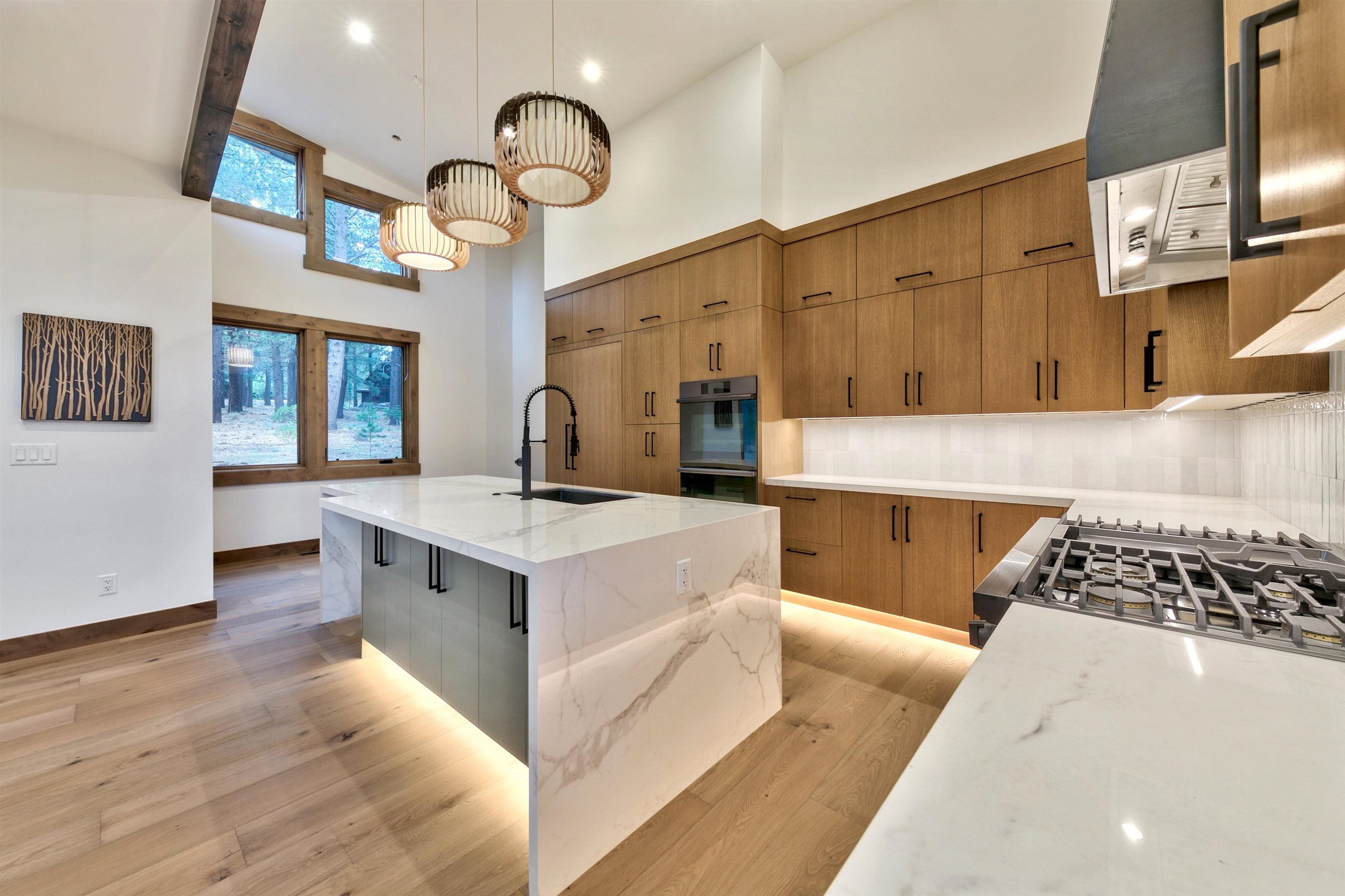 11620 Ghirard Road Truckee, CA 96161 - Photo 9 of 21 a kitchen with stainless steel appliances granite countertop a stove and a sink