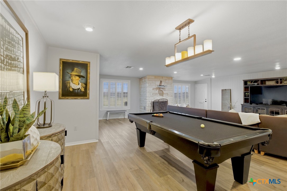 1710 Old Mill Road, Unit 12 Salado, TX 76571 - Photo 5 of 42 a room with pool table and windows
