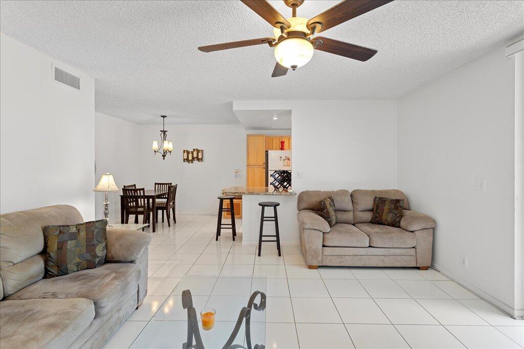 1124 Northwest 13th Street, Unit 120A Boca Raton, FL 33486 - Photo 6 of 23 Living Room 2