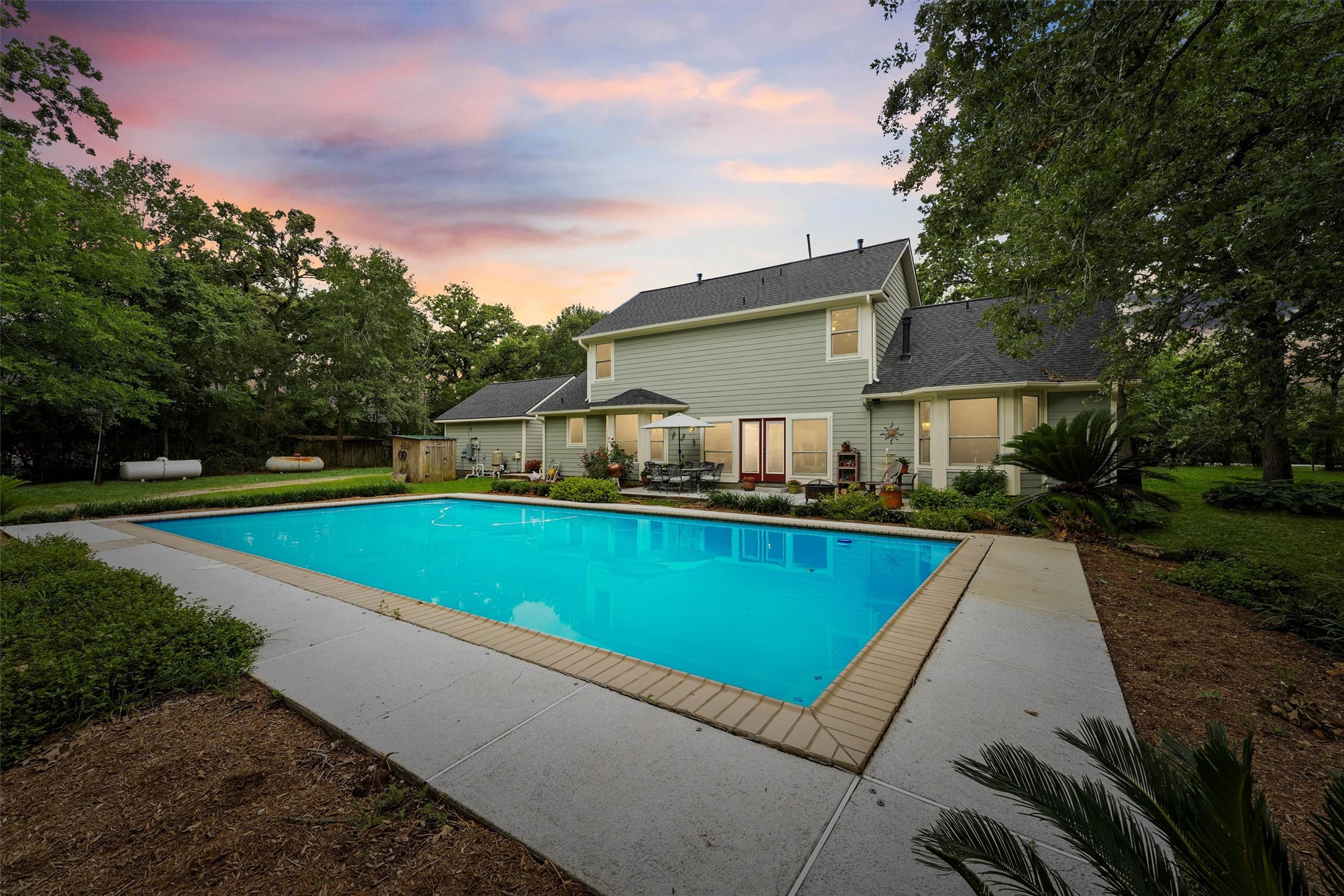 6803 Treaschwig Road Spring, TX 77373 - Photo 3 of 22 a view of a patio with swimming pool