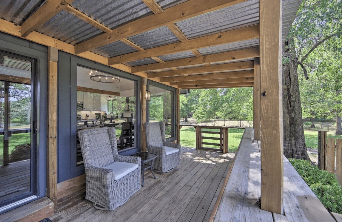 10630 River Ranch Road Kemp, TX 75143 - Photo 31 of 36 a view of a porch with furniture and wooden floor