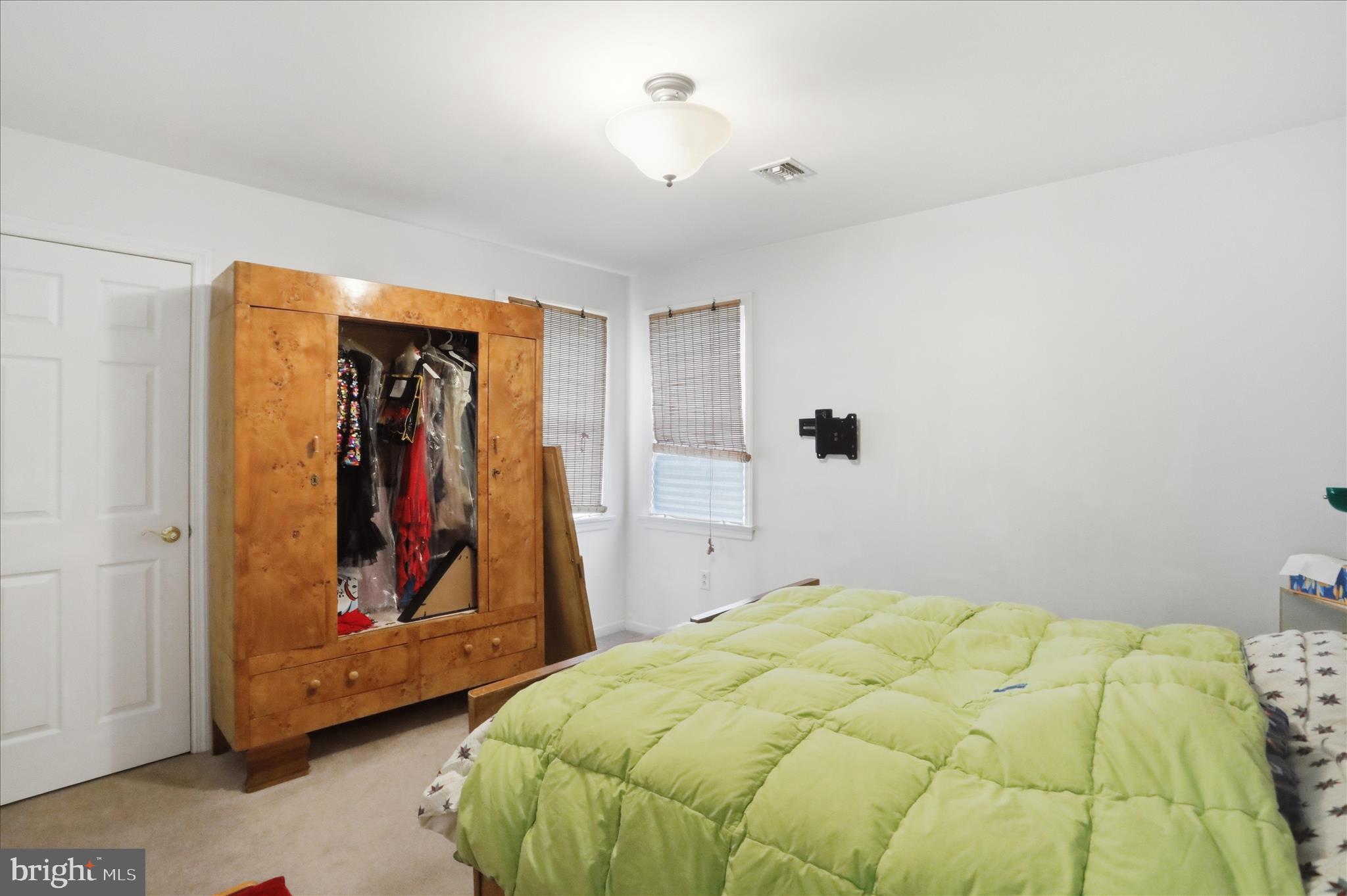 1175 North Lakewood Drive Ridgeley, WV 26753 - Photo 28 of 33 a bed room with a bed and a walk in closet