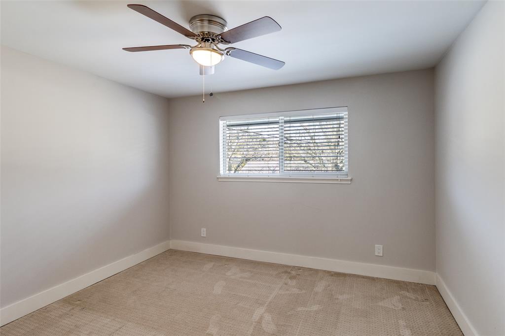 6159 Bandera Avenue Dallas, TX 75225 - Photo 10 of 13 an empty room with a window