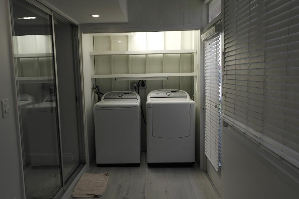 Kings Point Delray Beach, FL 33446 - Photo 12 of 14 a utility room with dryer and washer