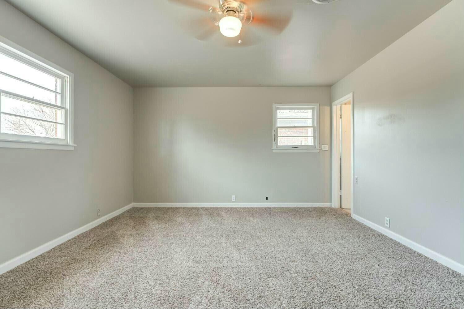 4407 49th Street Lubbock, TX 79414 - Photo 14 of 23 an empty room with a window