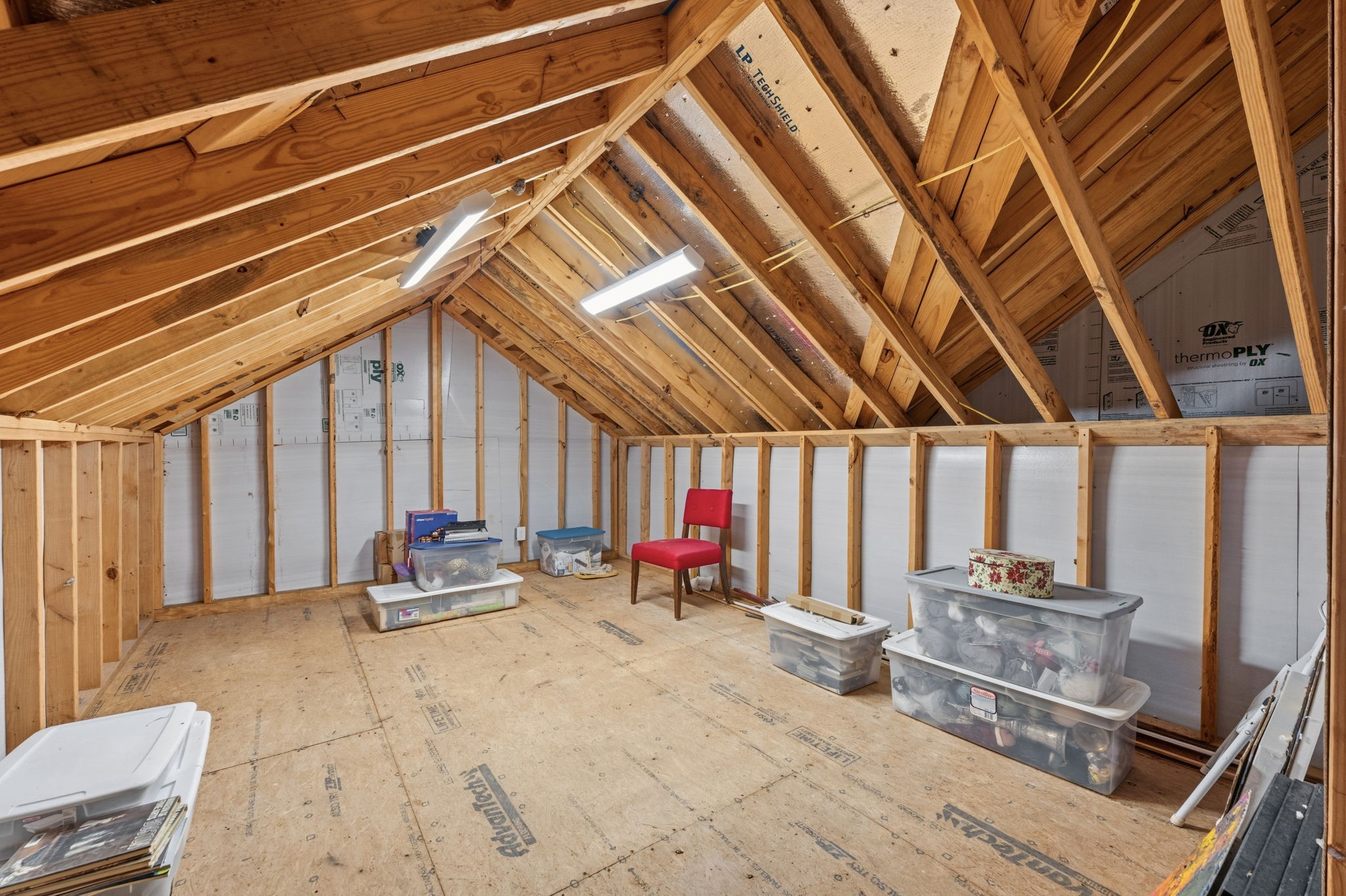 248 Fire Sky Road Huntsville, TX 77340 - Photo 29 of 36 Expansive bonus attic space offers exceptional storage and exciting potential for future conversion to a game room, additional bedroom or other living space.