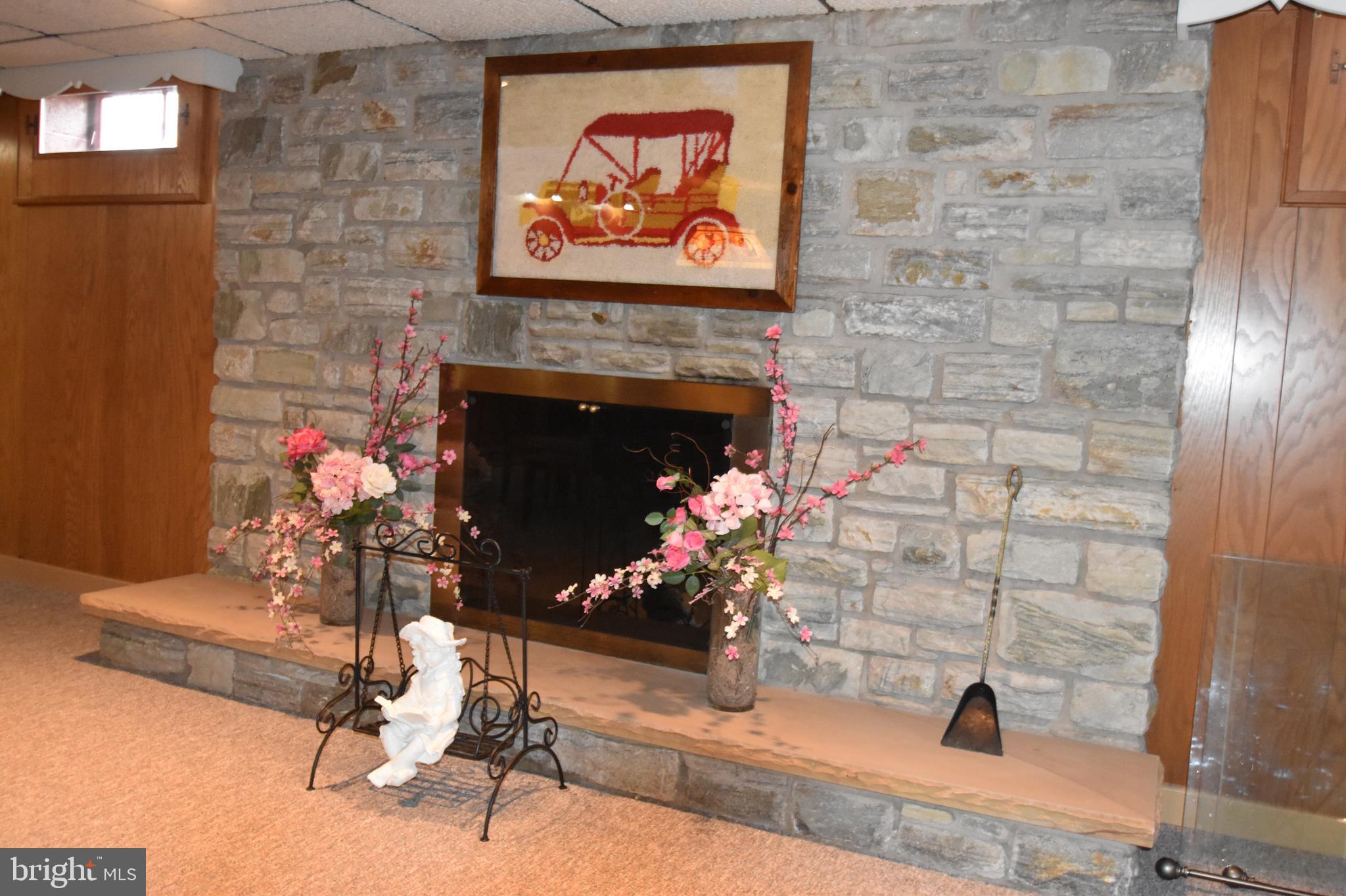 776 East Pumping Station Road Quakertown, PA 18951 - Photo 35 of 61 Lower level stone wood burning fireplace
