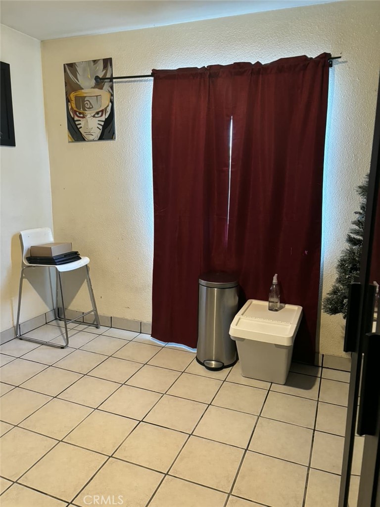 6911 Compton Avenue Los Angeles, CA 90001 - Photo 24 of 34 a bathroom with a sink and a toilet