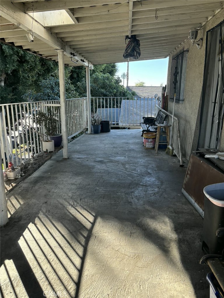 6911 Compton Avenue Los Angeles, CA 90001 - Photo 28 of 34 a view of a backyard with a patio