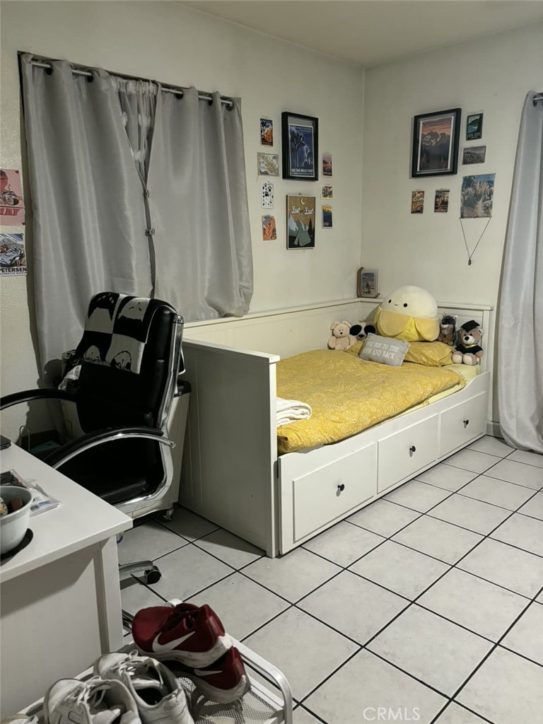 6911 Compton Avenue Los Angeles, CA 90001 - Photo 29 of 34 a bathroom with a sink and a mirror