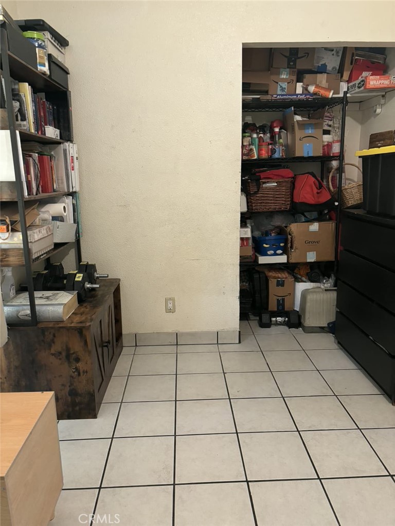 6911 Compton Avenue Los Angeles, CA 90001 - Photo 30 of 34 a room with storage and utility