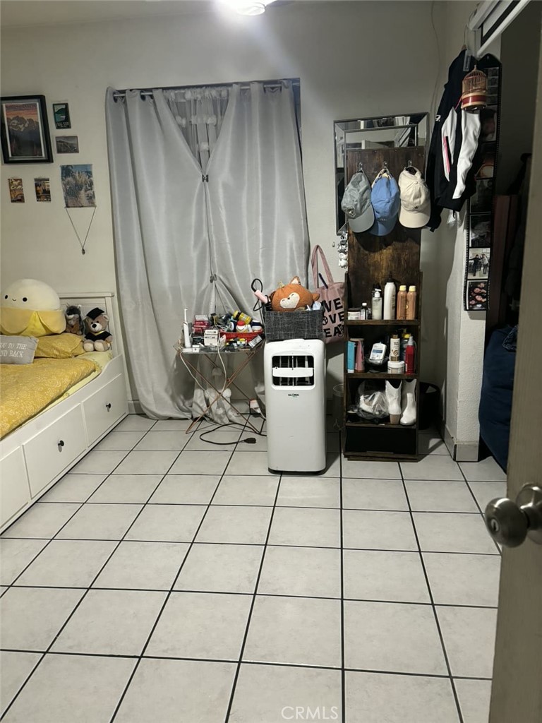 6911 Compton Avenue Los Angeles, CA 90001 - Photo 34 of 34 a kitchen with stainless steel appliances granite countertop a sink and a refrigerator