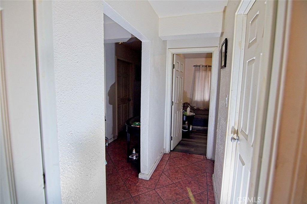 6911 Compton Avenue Los Angeles, CA 90001 - Photo 5 of 34 a view of a hallway with interior of the house