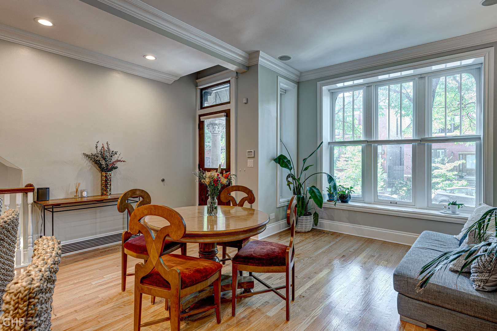 2116 West Potomac Avenue, Unit 1 Chicago, IL 60622 - Photo 6 of 24 a view of a livingroom with furniture window and wooden floor