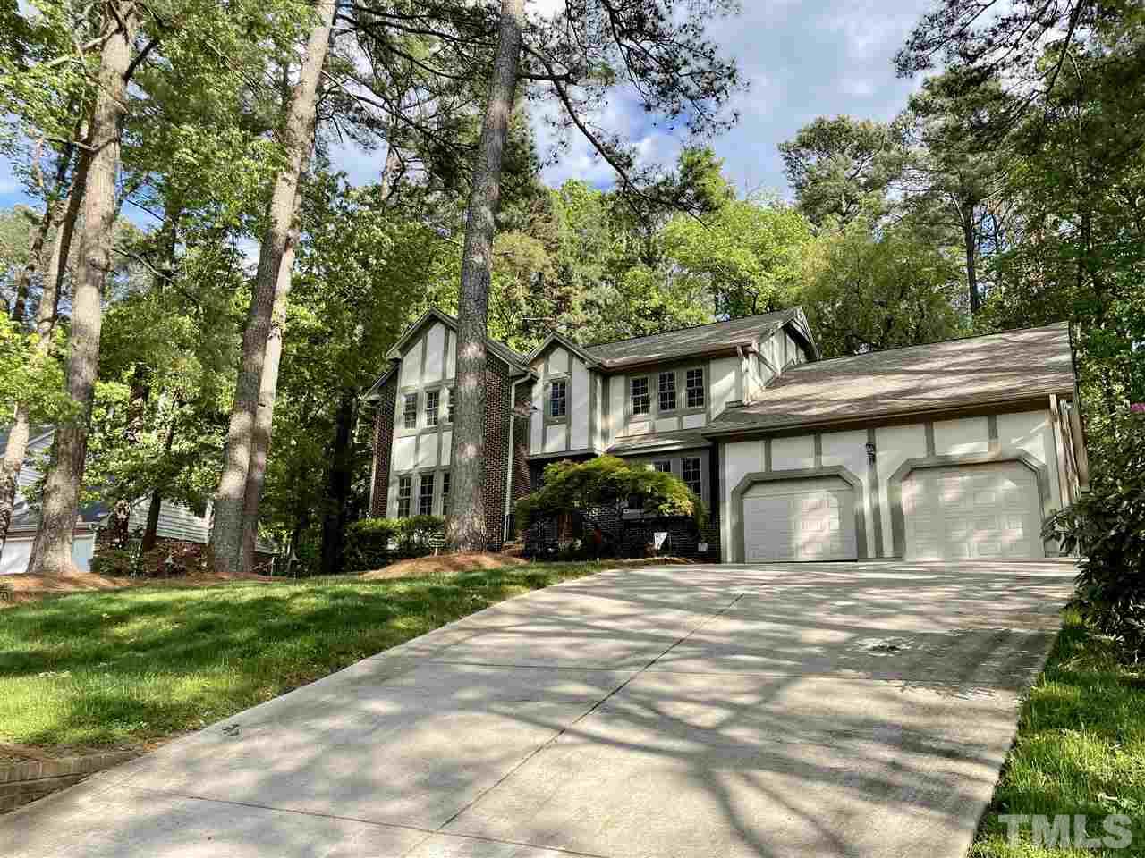 7804 Harps Mill Road Raleigh, NC 27615 - Photo 2 of 3 front view of house with a yard
