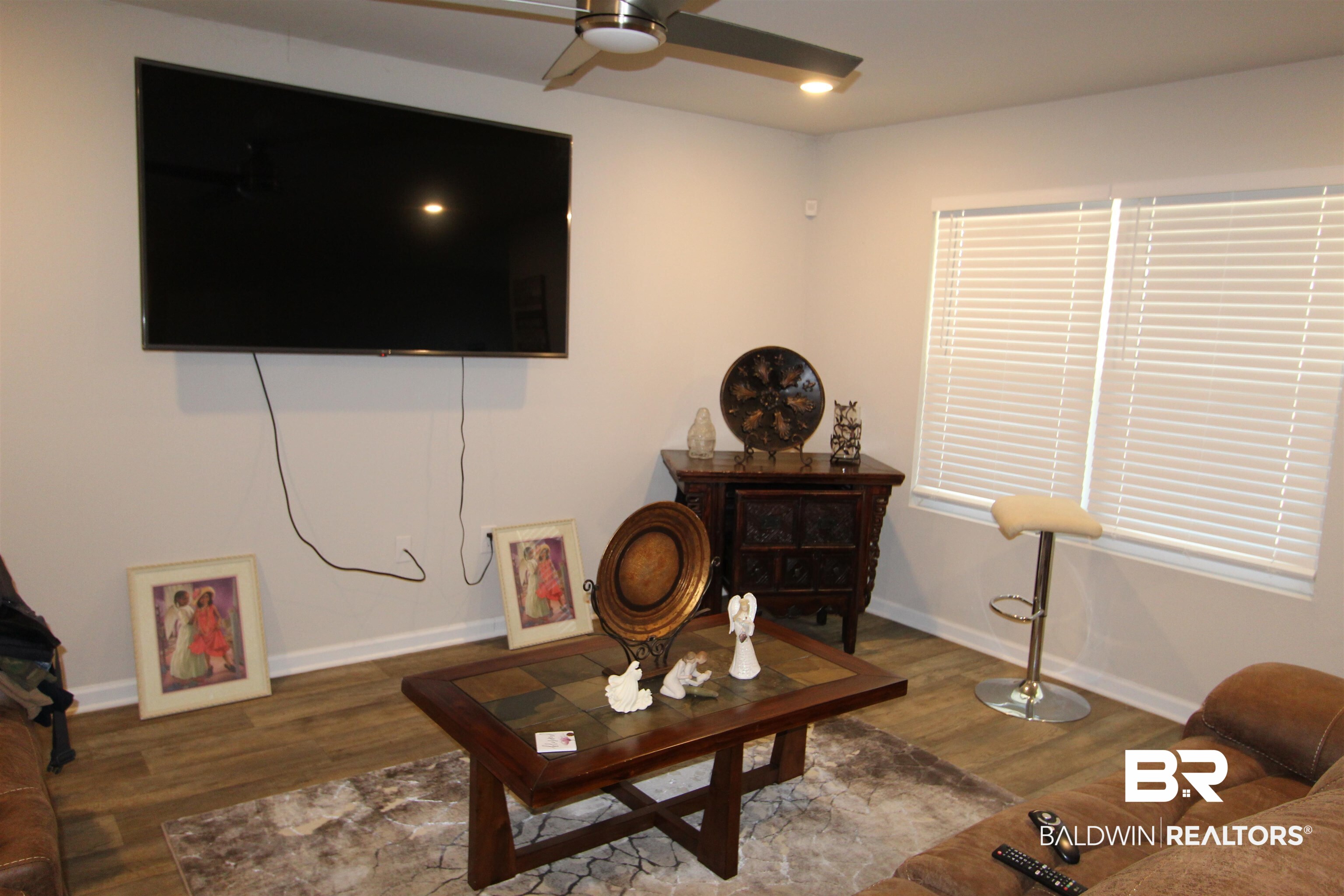 1502 Majesty Loop Foley, AL 36535 - Photo 26 of 26 Living room with dark wood-type flooring and ceiling fan