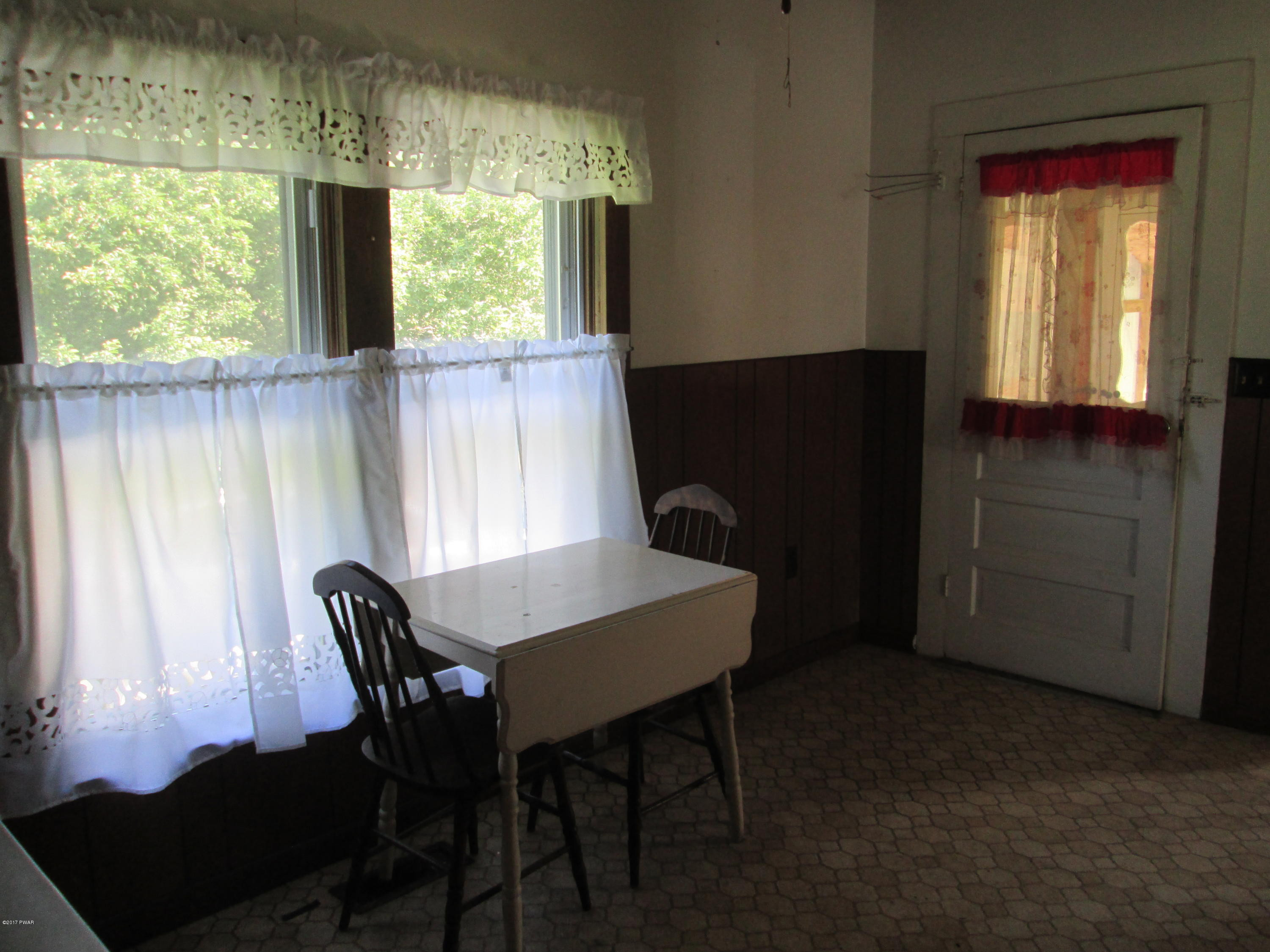 86 Beaver Hollow Road Lakewood, PA 18439 - Photo 10 of 30 a view of a dining room with furniture and window