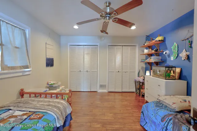 a view of a town with large trees