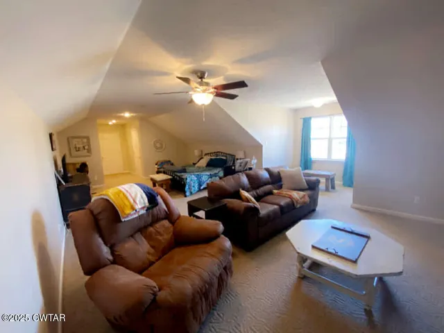 a room that has a window and a table in it