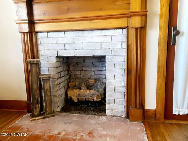 a view of a dining room with furniture and window