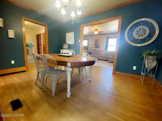 a kitchen with a window and cabinets