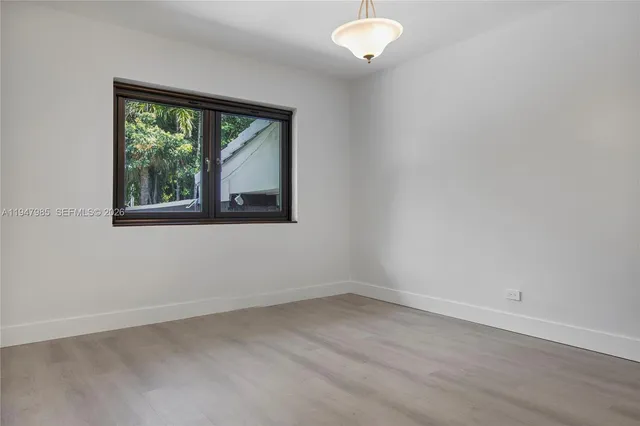 an empty room with a window