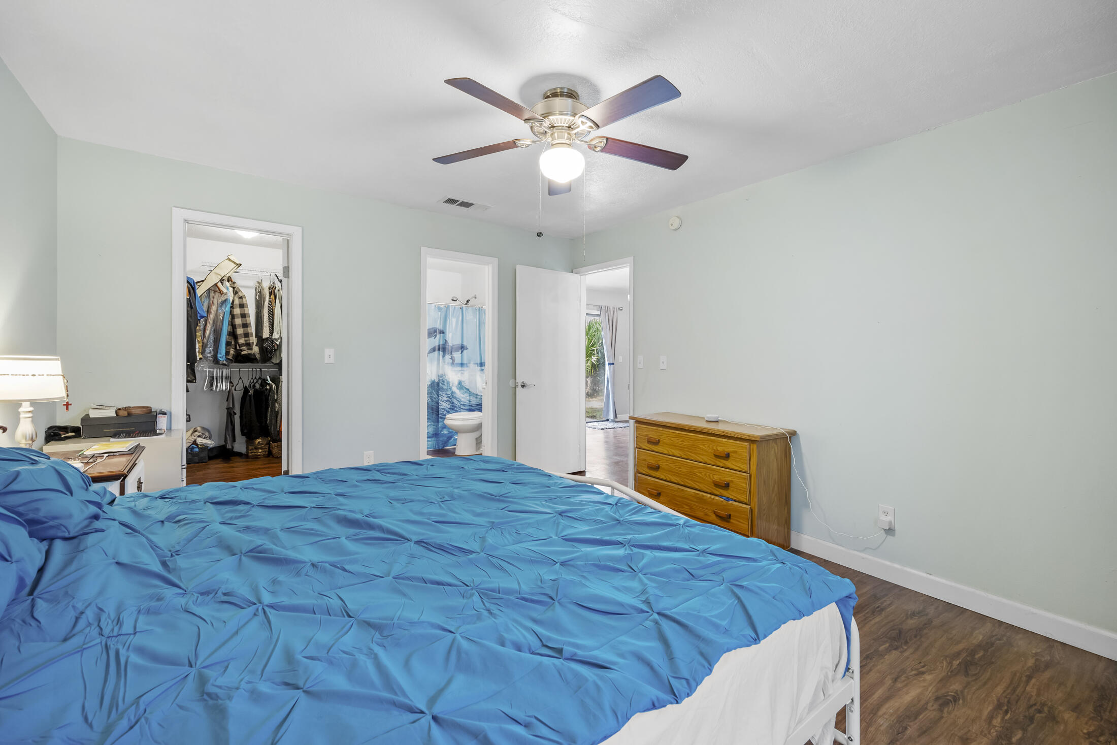 938 Cherokee Road Southeast Palm Bay, FL 32909 - Photo 13 of 29 a bedroom with a bed and window