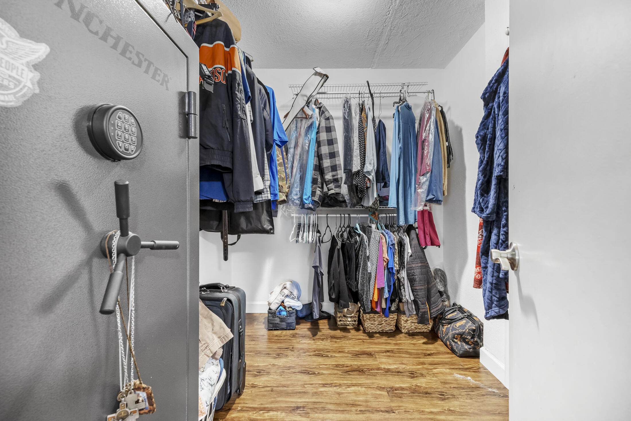 938 Cherokee Road Southeast Palm Bay, FL 32909 - Photo 15 of 29 a view of walk in closet with clothes
