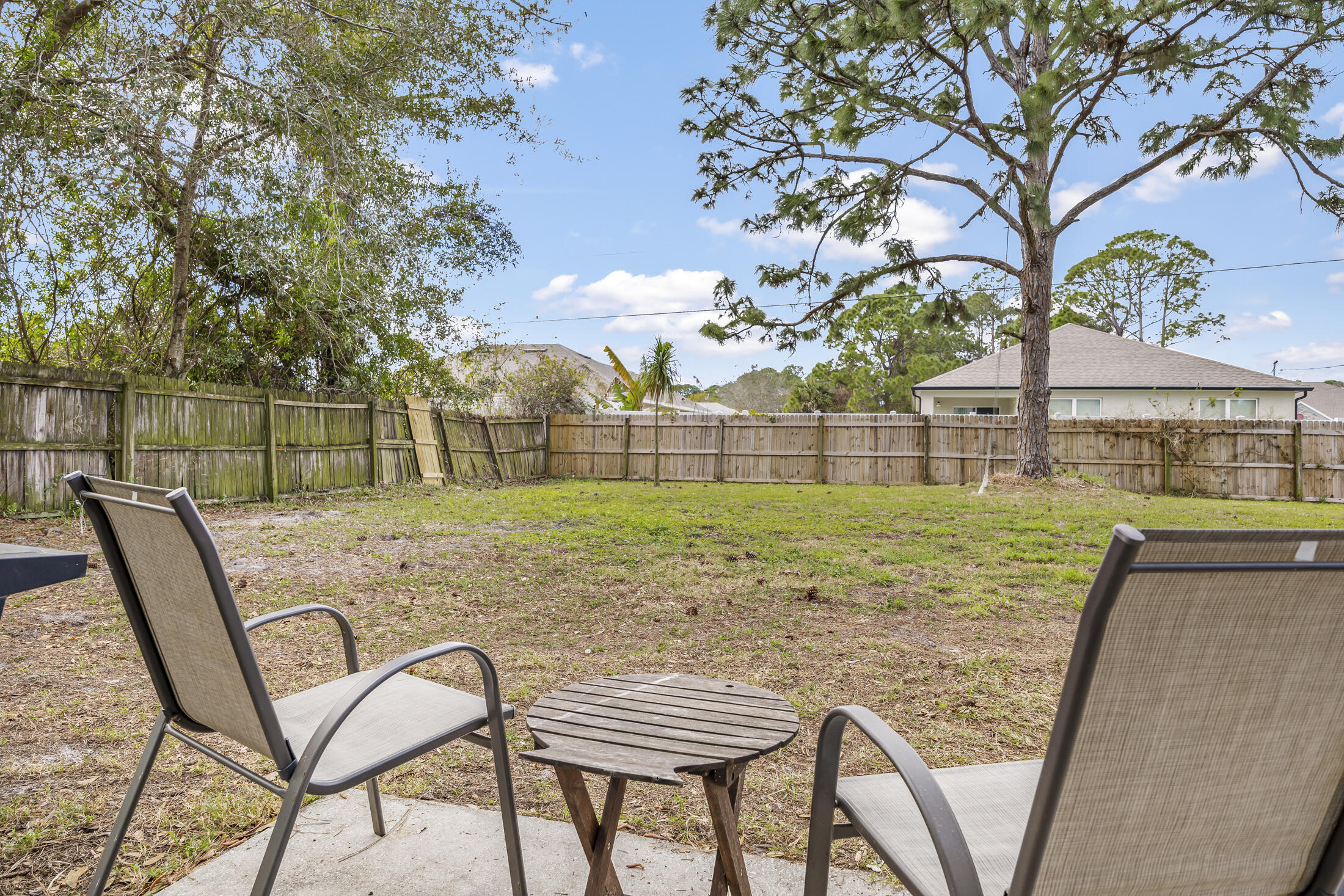 938 Cherokee Road Southeast Palm Bay, FL 32909 - Photo 21 of 29 a view of a yard with a slide