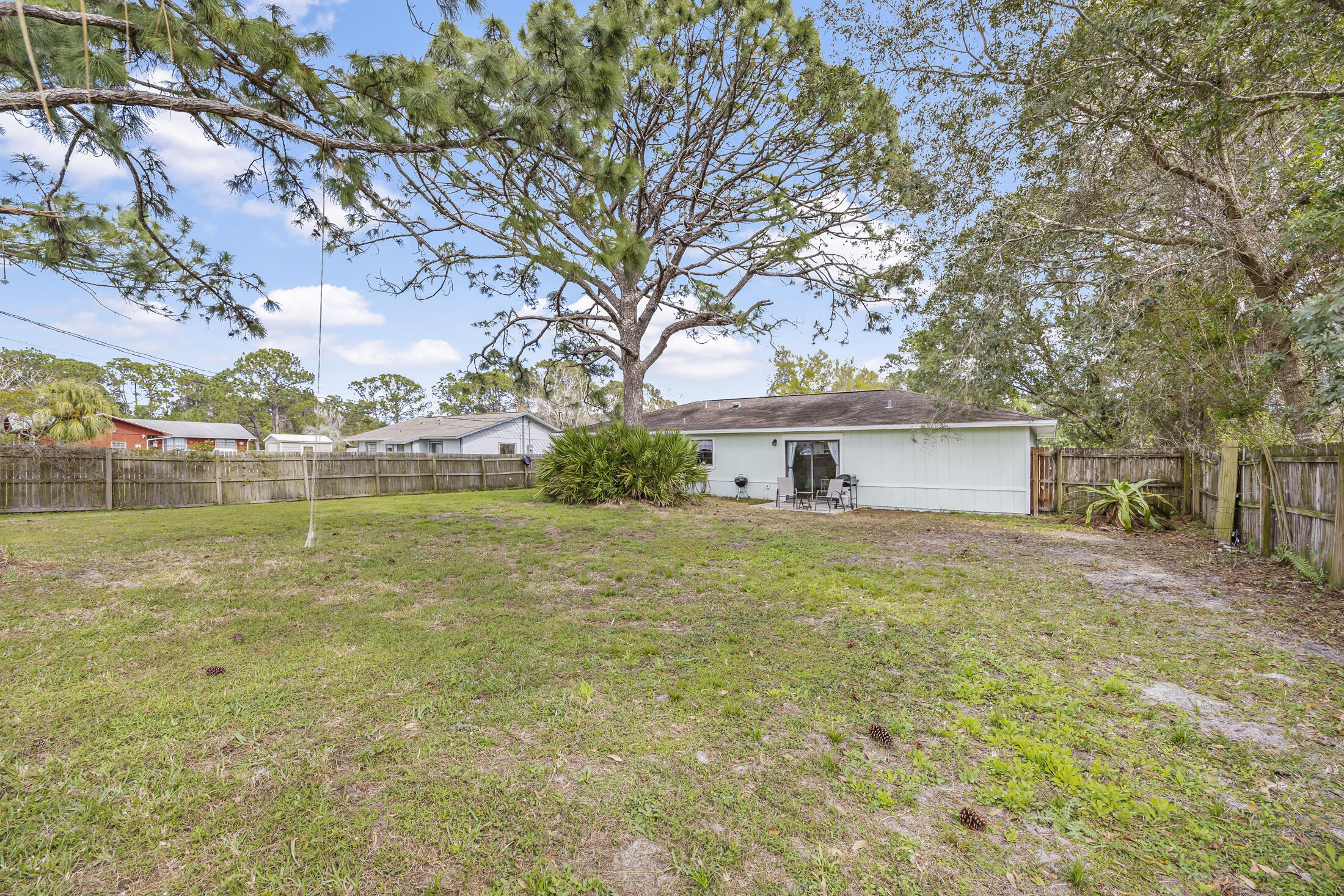 938 Cherokee Road Southeast Palm Bay, FL 32909 - Photo 23 of 29 a view of a house with a yard