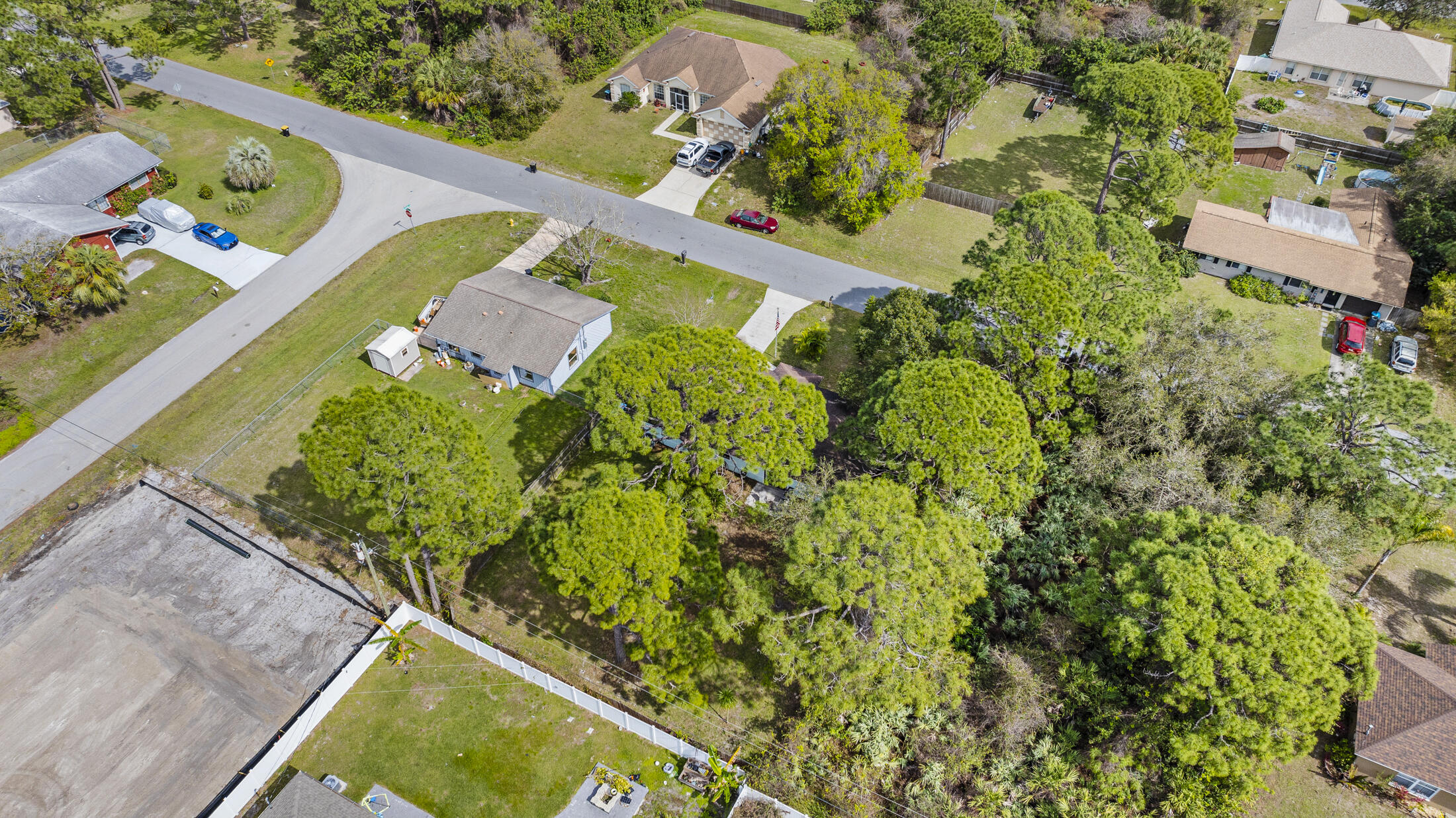 938 Cherokee Road Southeast Palm Bay, FL 32909 - Photo 26 of 29 an aerial view of a house a garden and mountain view