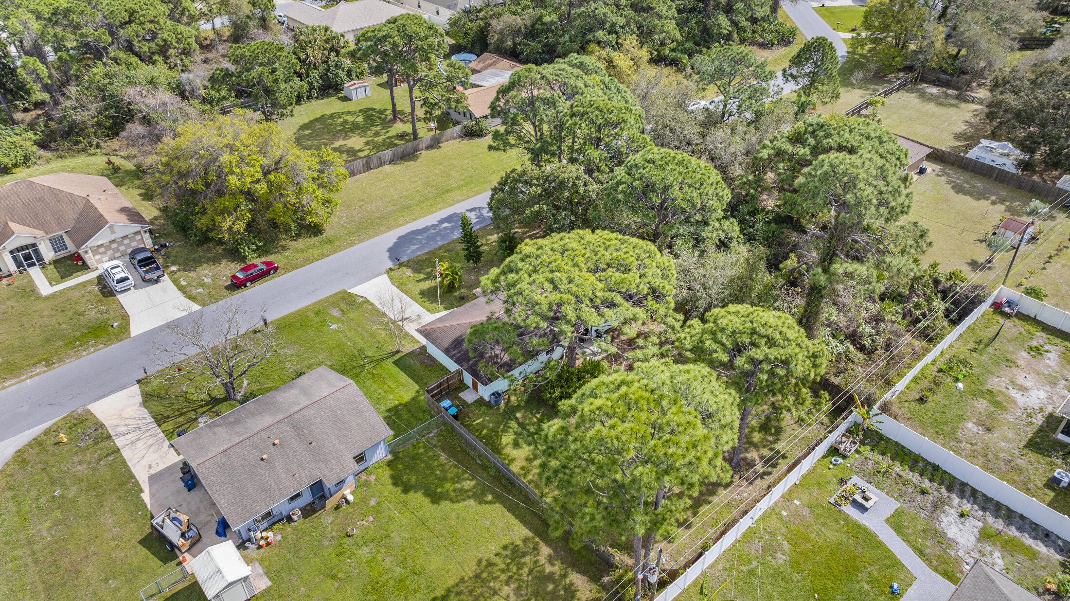 938 Cherokee Road Southeast Palm Bay, FL 32909 - Photo 27 of 29 an aerial view of residential houses with outdoor space