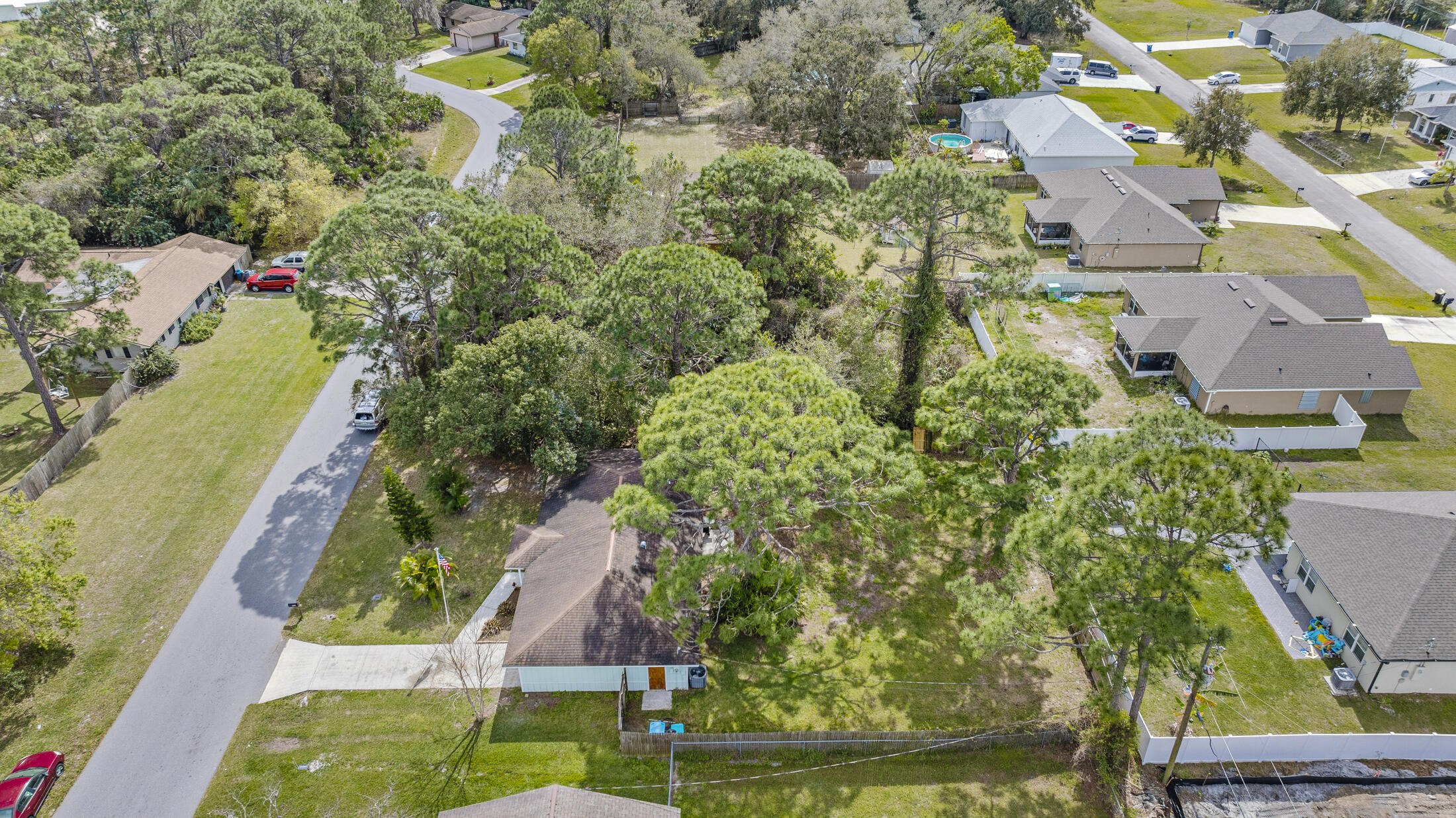 938 Cherokee Road Southeast Palm Bay, FL 32909 - Photo 28 of 29 an aerial view of residential houses with outdoor space
