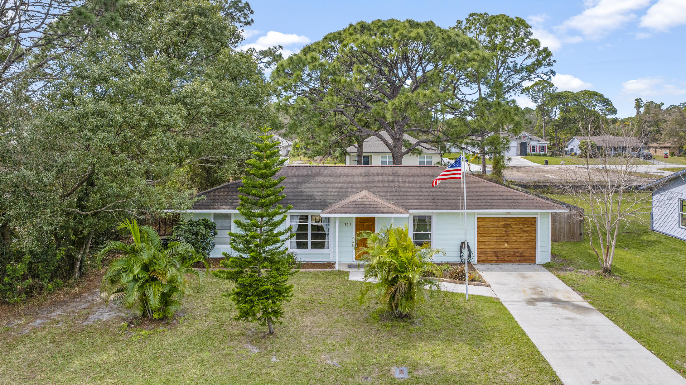 938 Cherokee Road Southeast Palm Bay, FL 32909 - Photo 29 of 29 a house that has a tree in it