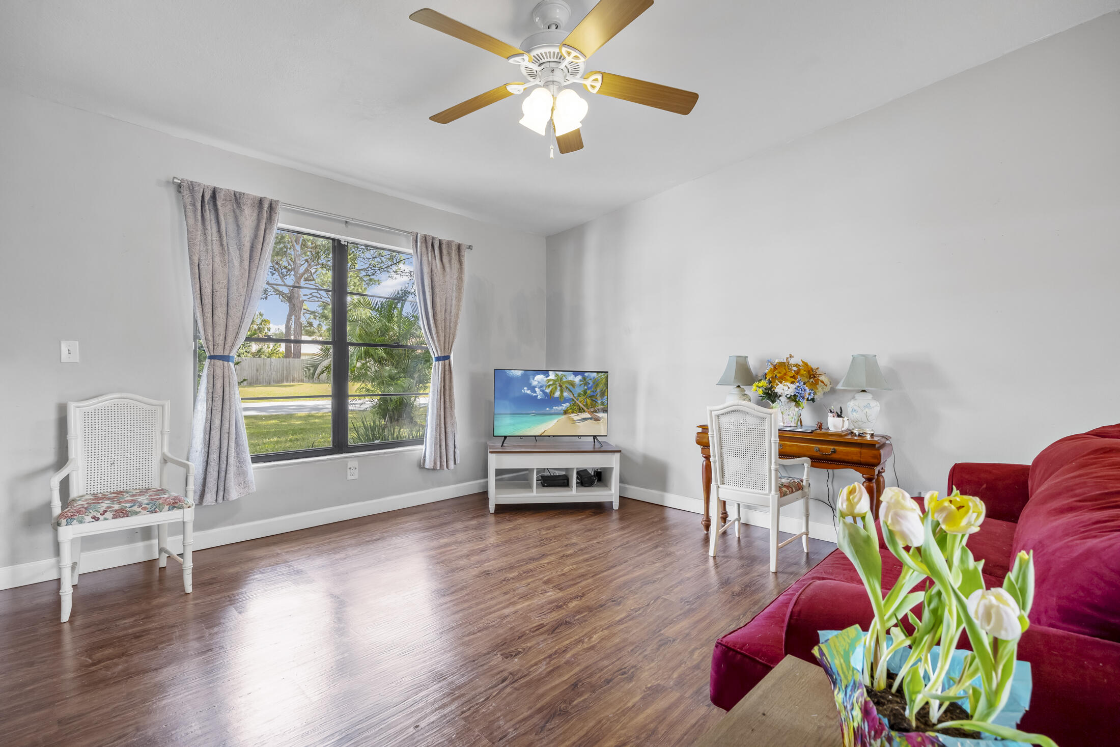 938 Cherokee Road Southeast Palm Bay, FL 32909 - Photo 8 of 29 a living room with furniture and a table